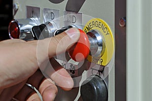 Emergency button to stop an industrial machine in a dangerous situation
