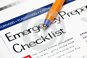 Emergency Checklist and ballpoint pen