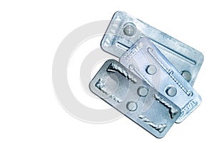 Emergency contraceptive pills in blister pack isolated on white background. Morning after pills. Cause of ectopic pregnancy.