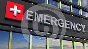 Emergency department building sign closeup, with sky