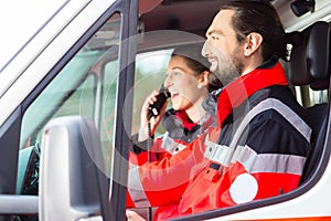 Emergency doctor driving in ambulance