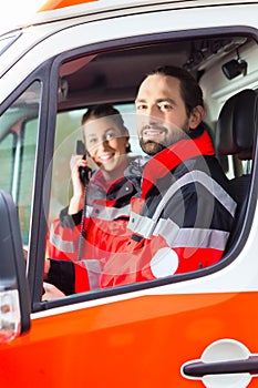 Emergency doctor driving in ambulance