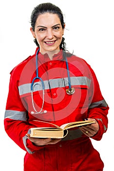 Emergency doctor reading a book