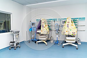 Emergency empty hospital baby ward. Modern interior emergency with nobody in ward.