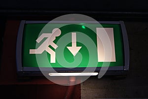 Emergency exit backlit green sign