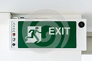 Emergency exit sign. Direction to the escape way.