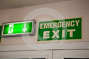 Emergency exit sign over doors.