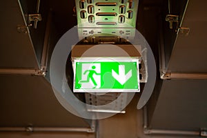 Emergency exit sign over doors.