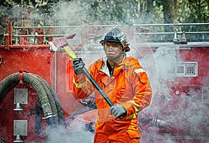 Emergency Fire Rescue training, firefighters in uniform, arm wit