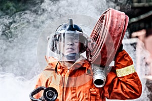 Emergency Fire Rescue training, firefighters in uniform, carry