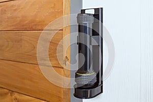 Emergency flashlight at door for urgent case