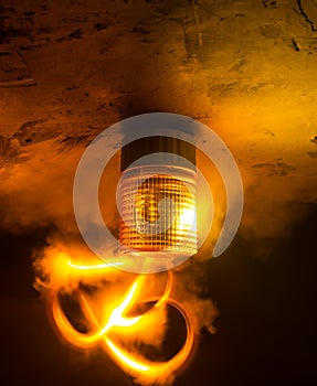 Emergency lighting in the factory, Warning light, Orange siren on concrete wall
