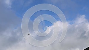 Emergency medivac helicopter flies over steam vents on Mt. Asahi