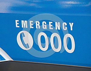 Emergency number 000 on an ambulance