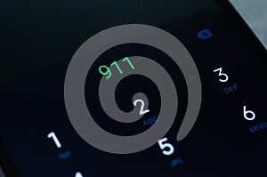 Emergency number 911 displayed on a  cell phone