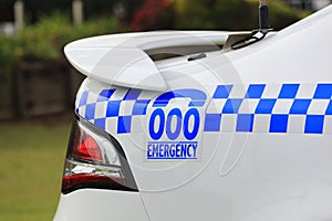 Emergency number labeling on police car