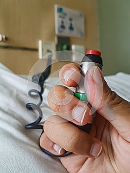 Emergency nurse call button in hospital room. emergency botton for patient on bed at hospital ward. health care concept. Close Up