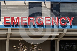 Emergency Room and Emergency Department entrance sign for a hospital in alert red