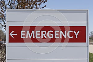 Emergency Room ER and Emergency Department entrance sign for a hospital in alert red
