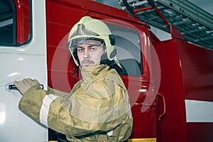 Emergency safety. Protection, rescue from danger. Fire fighter in protective helmet. Adult man, hero in equipment, uniform at work