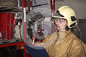 Emergency safety. Protection, rescue from danger. Fire fighter in protective helmet. Adult man, hero in equipment, uniform at work