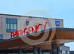 Emergency sign above entrance to hospital