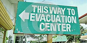 Emergency sign directing people to an Evacuation center in the Philippines.