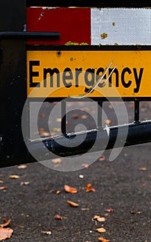 Emergency Sign Gated Street Close Up