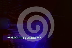 Emergent security alert on computer photo