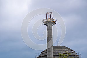 Emerging Minaret: Construction of a Mosque in Progress