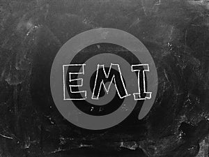 EMI Handwritten on Blackboard