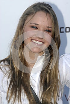 Emily Osment on the red carpet.