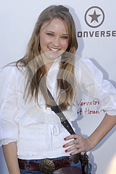 Emily Osment on the red carpet.