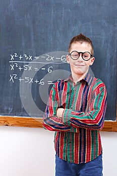 Eminent boy at chalkboard