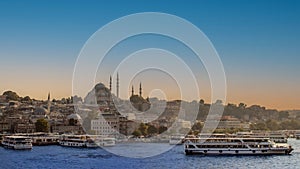 Eminonu Harbor with Fatih Mosque, Istanbul Turkey . Travel concept and sea front view