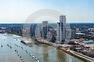 Emirates Air Line cable cars on thames river in London, UK