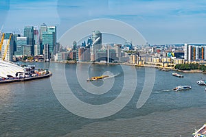 Emirates Air Line cable cars on thames river in London, UK