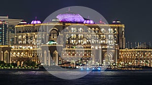 Emirates Palace illuminated at night timelapse, Abu Dhabi, United Arab Emirates