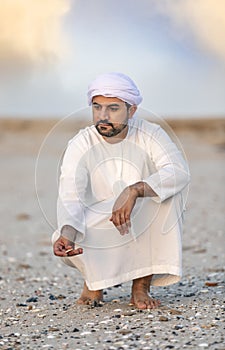 emirati man on the beach photo