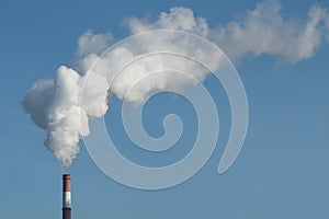 Emission of gases from the chimney at a power photo