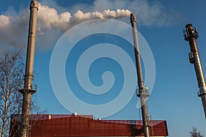 Emission measurements on a chimney discharging wet flue gases from a biomass boiler
