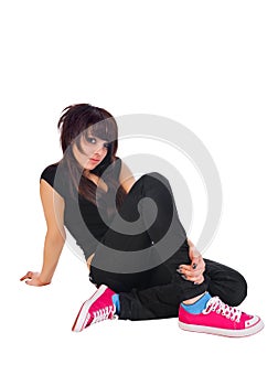 Emo girl sitting on white