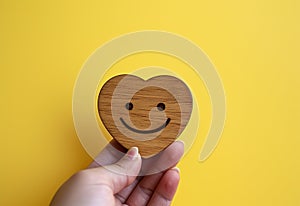 emoticon with a smiling face - a symbol of happiness and love