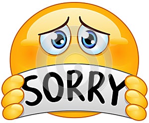Emoticon with sorry sign photo