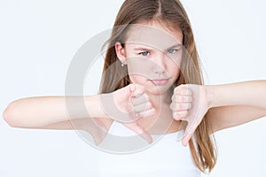 Emotion annoyed displeased child thumbs down girl