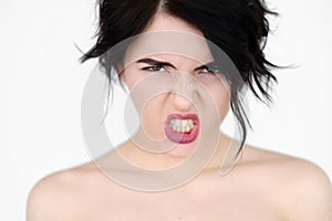 Emotion face furious woman rage baring teeth photo