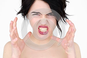 Emotion face rage fury strangle woman baring teeth photo
