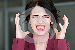 Emotion face stress woman exploding head overwork