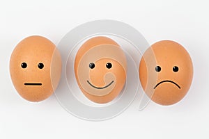Emotion painted of eggs isolated on white