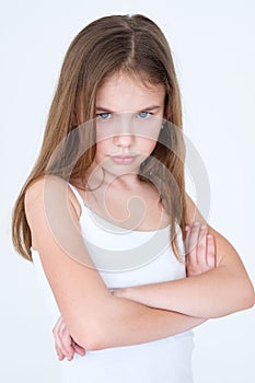 Emotion sad hurt offended child girl crossed arms